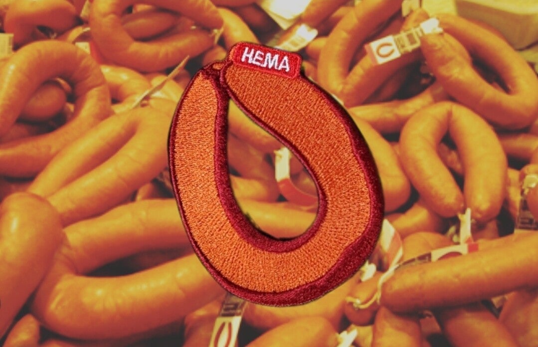 KR105 Embleem Hema worst