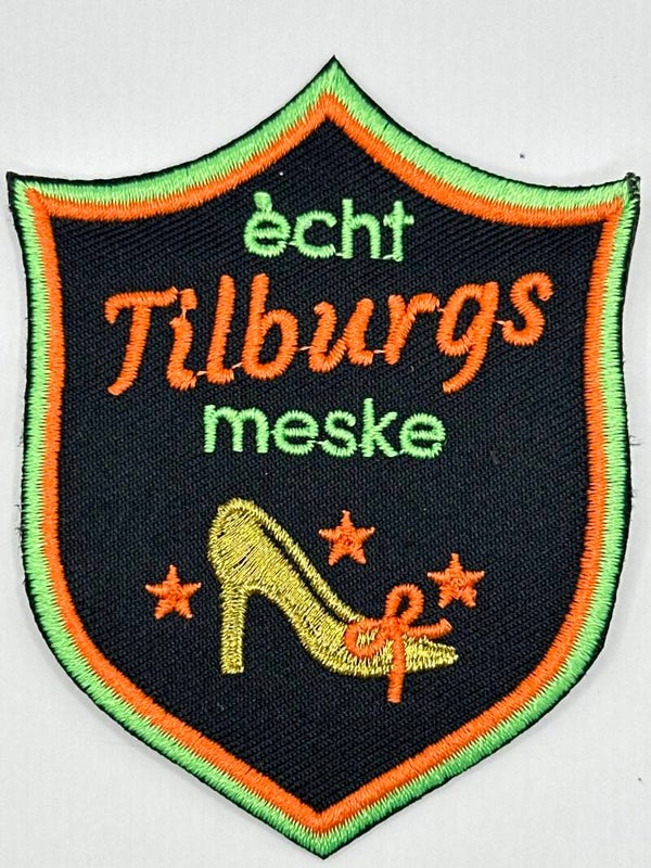 KR229. Embleem tilburgs meske