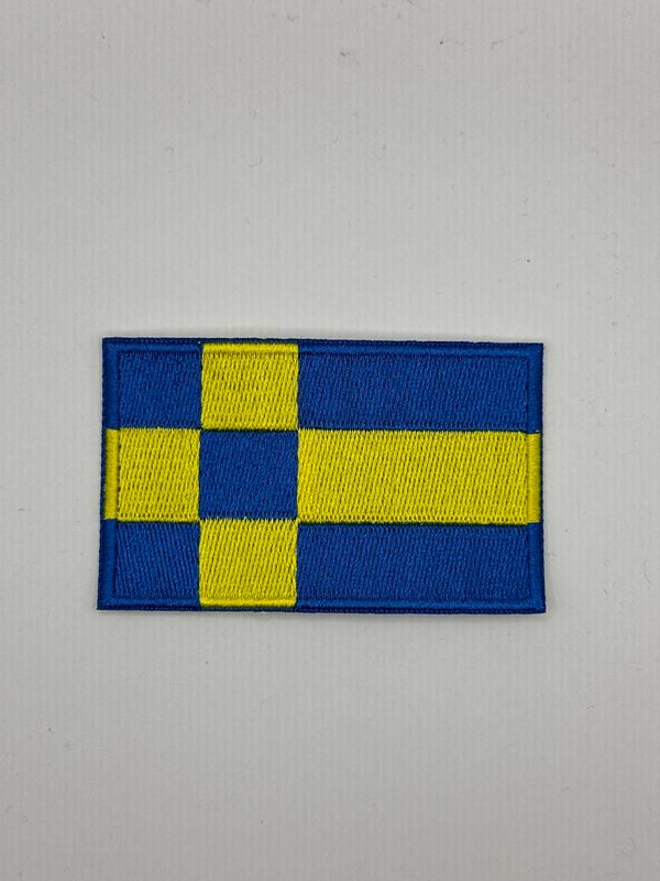 KR181. Vlag Tilburg embleem