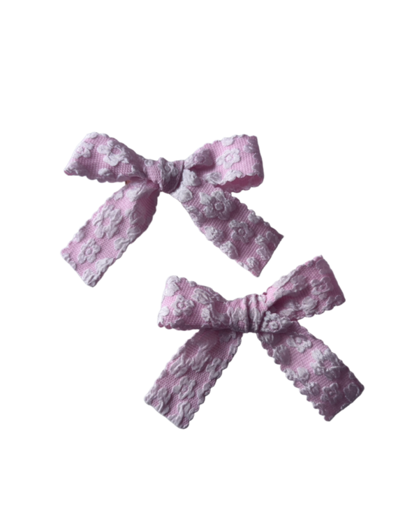 Strikjes roze (2 stuks)