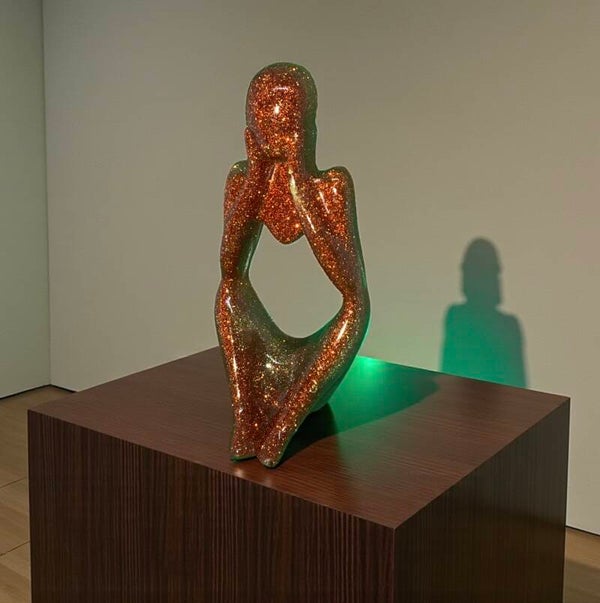 Woman Holding Her Face
