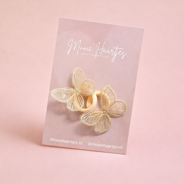 Klein elastiekjes - 2 Vlinders zalm roze