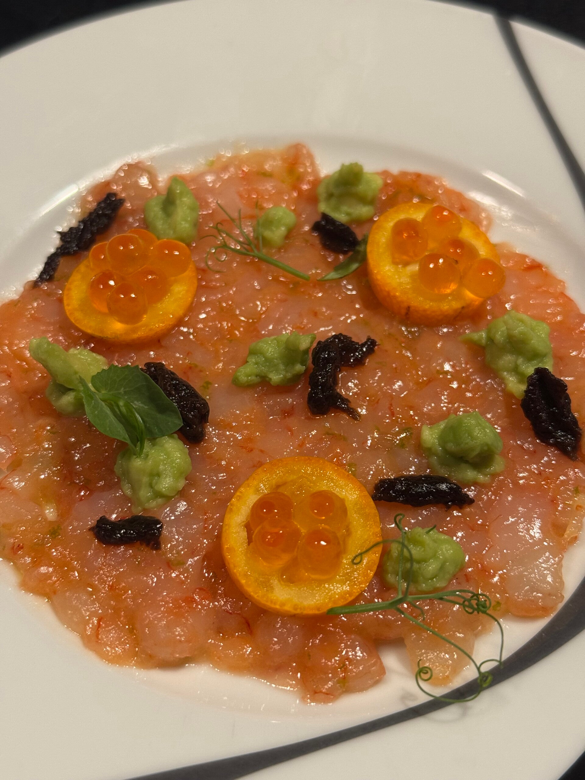 Luxury Sicilian red prawn carpaccio with fresh citrus and microgreens, high-end private dining starter by personal chef.