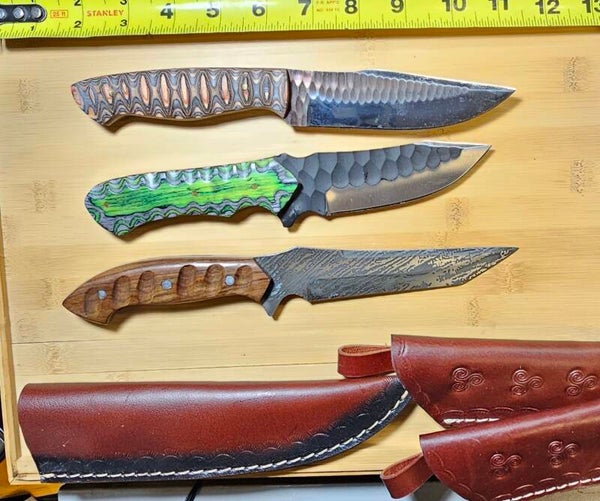 Stainless steel fixed blade with leather sheeth