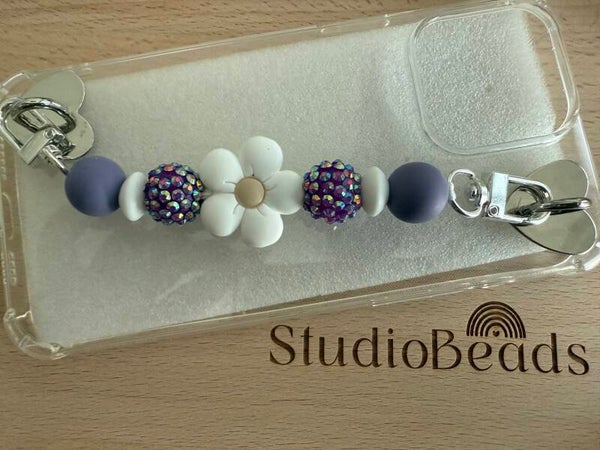 Telefoonkoord op hoesje