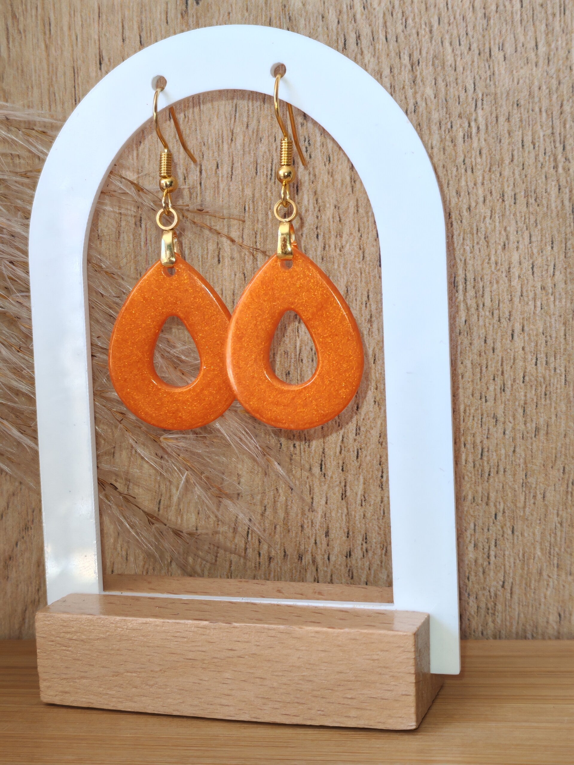 Les boucles d'oreilles Hosta Lisse orange