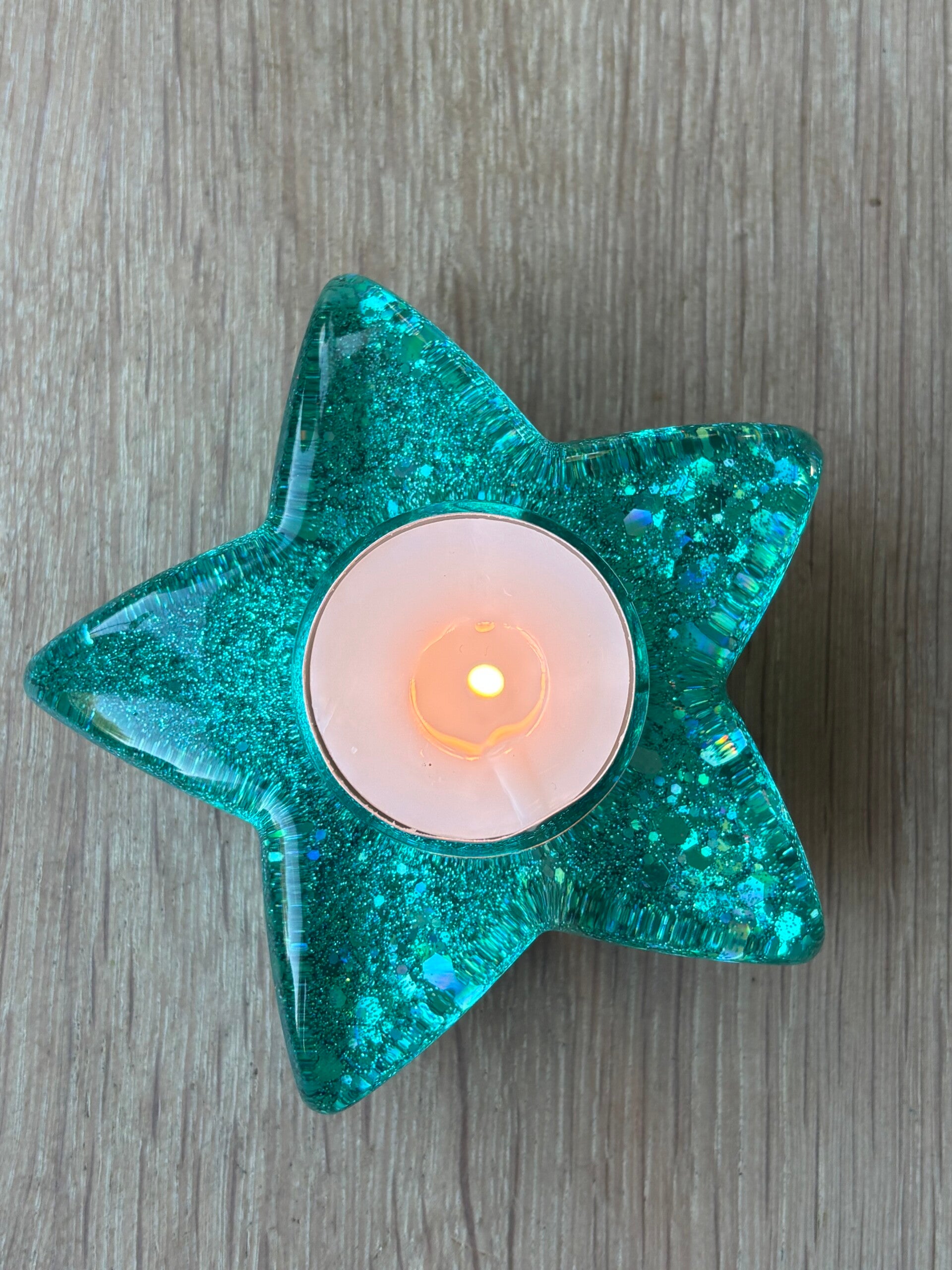 Theelichthouder ster “kerst” in turquoise/glitter