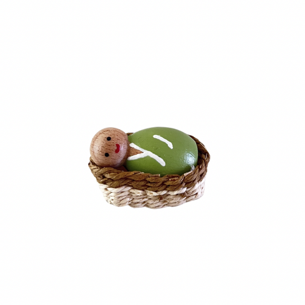 Babypoppetje in Mozesmandje