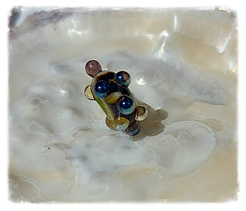 Glaskraal / glasbedel / kraal 'Aztec Sun' - geel, zwart, metallic past o.a. op Pandora en Trollbeads
