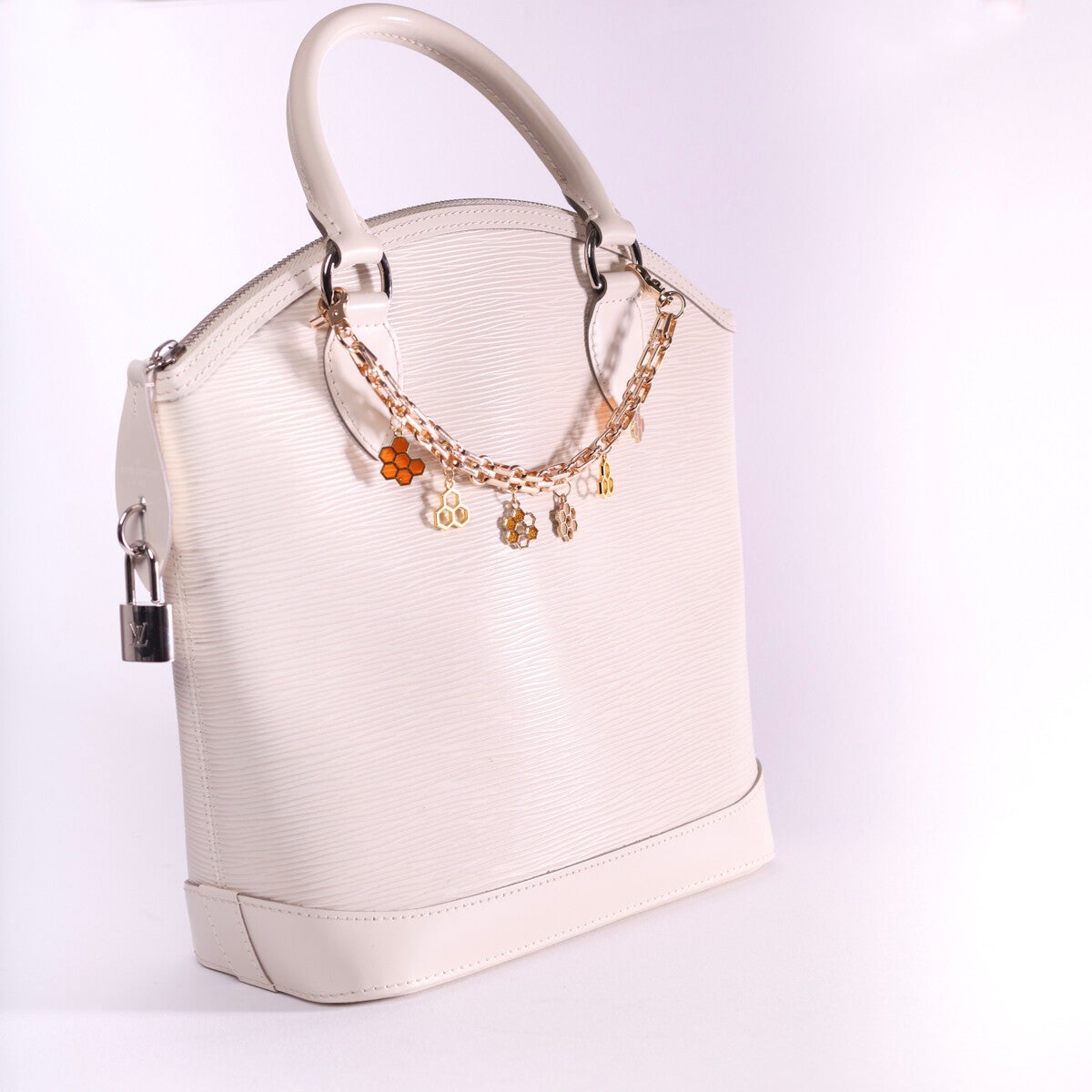 LV Alma epi leather ivory