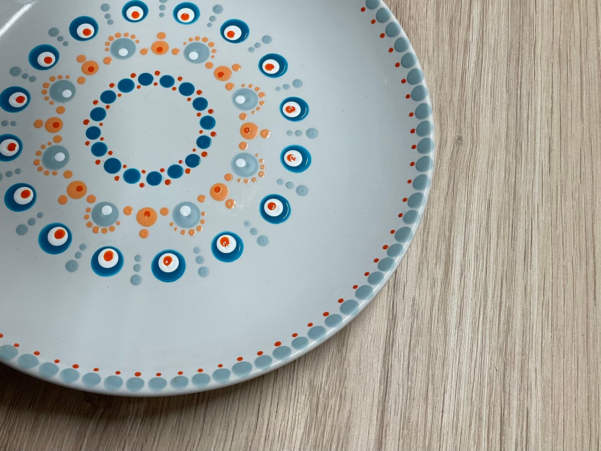 Een spiegel bewerkt met glasetspasta