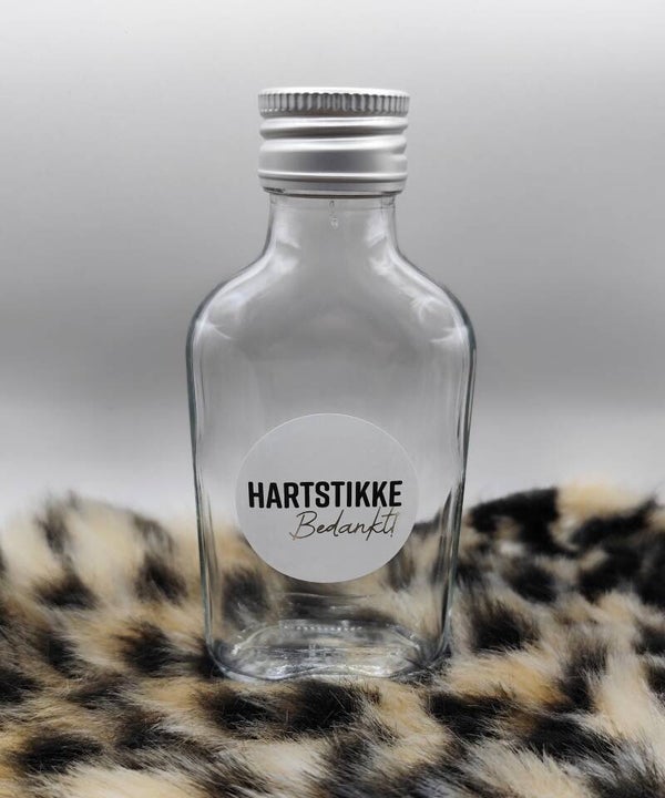 Glazen flesje bedankt