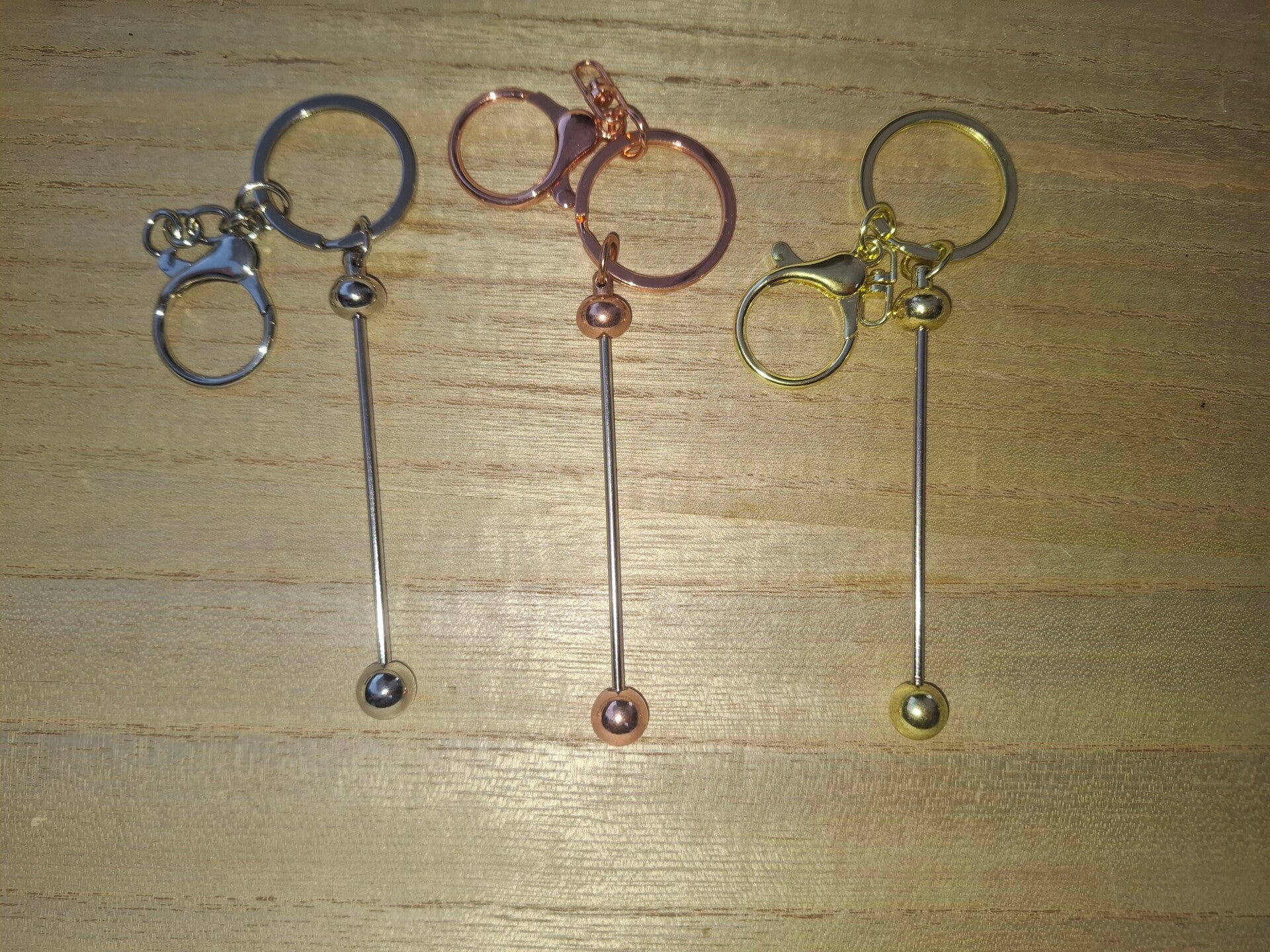 Kralen sleutelhanger staaf chroom