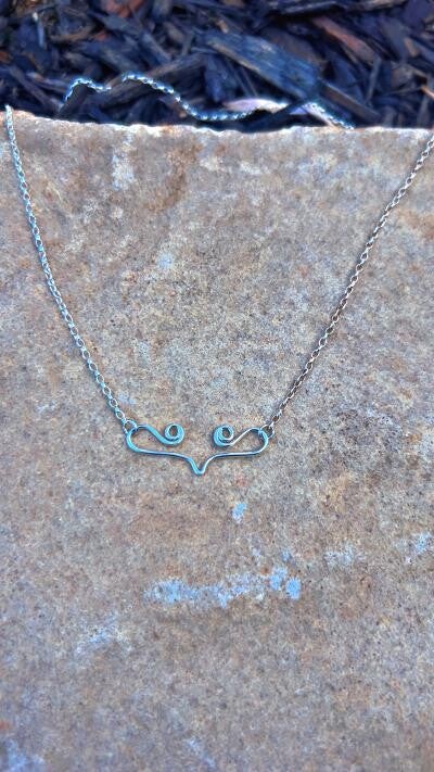 silver swirl necklace