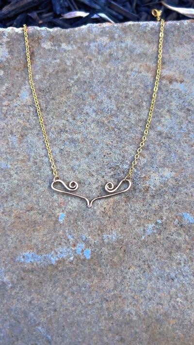 gold swirl necklace