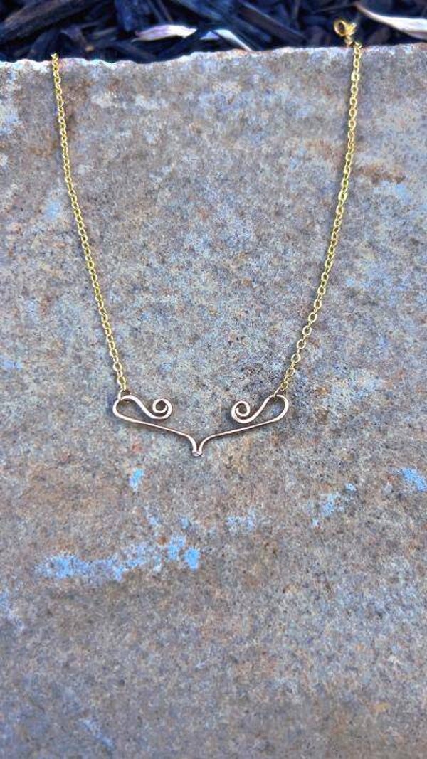 gold swirl necklace