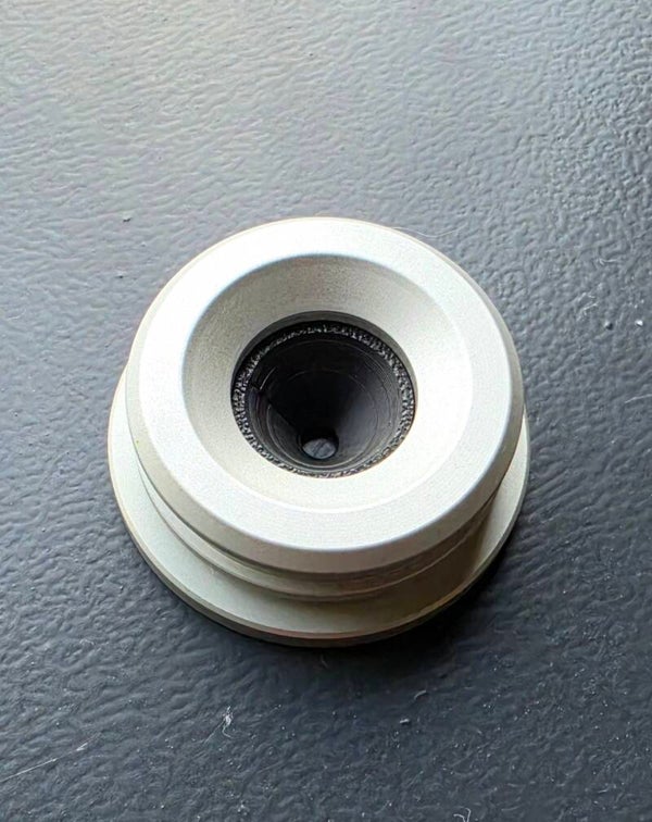 A magnetic base unit with a conical-shaped recess