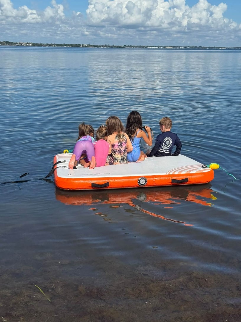 Children exploring the coastal lagoon together