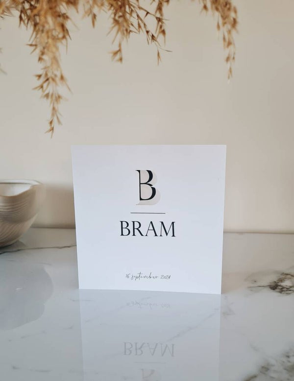 Initiaal gestanst - geboortekaartje