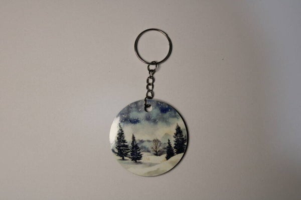 Sleutelhanger met dennenbomen