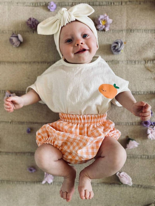 Nani's orange top and bottom set