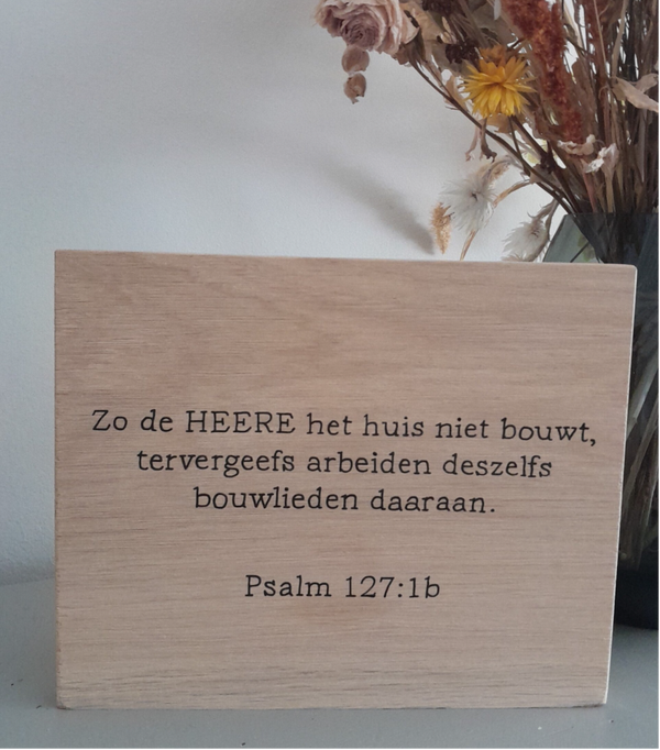 Bijbeltekst op hout