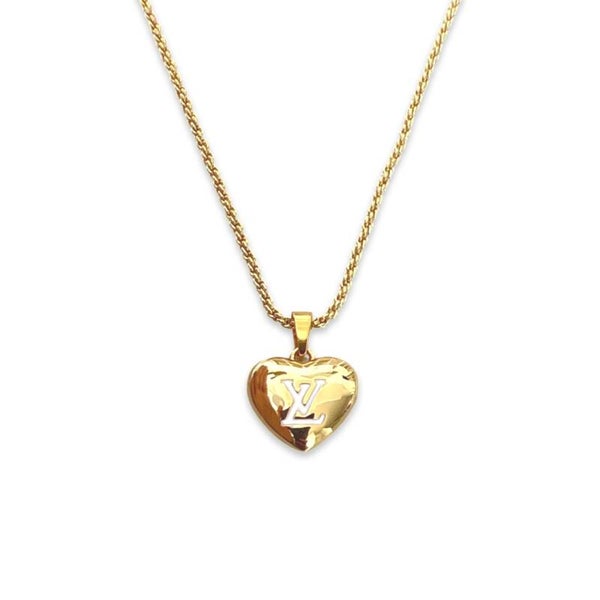 Authentic reworked Louis Vuitton heart necklace.