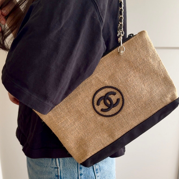 Vintage Chanel make-up pouch reworked into a bag.