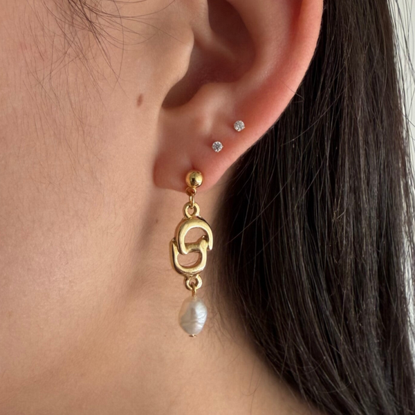 Dior bracelet charms | Fresh water pearls earrings.