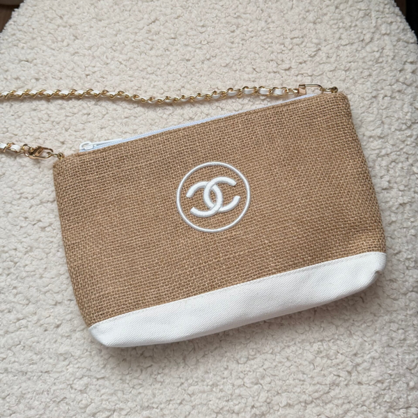 Vintage Chanel make-up pouch reworked into a bag.