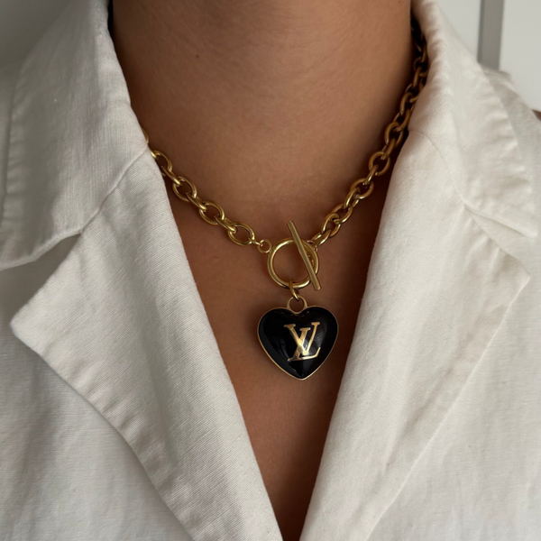 Authentic Louis Vuitton black heart charm - necklace.