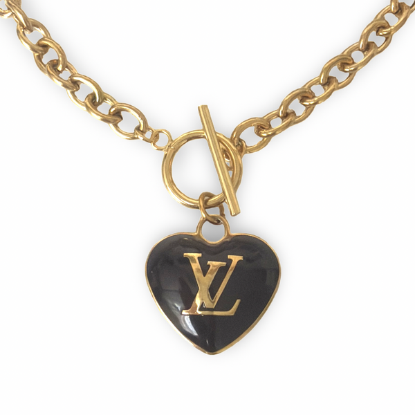 Authentic Louis Vuitton black heart charm - necklace.