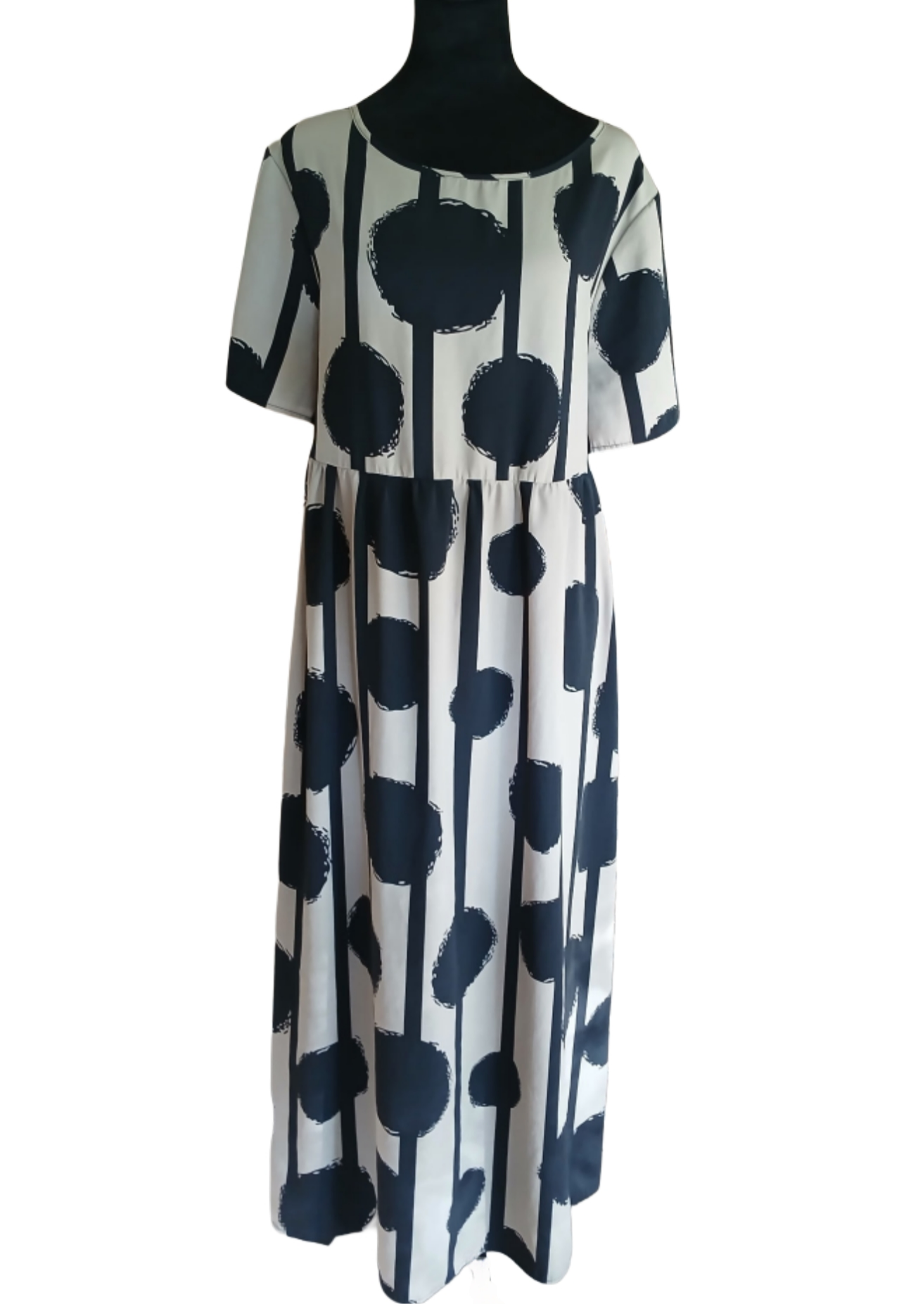 Black and Tan Dress with Polka Dots. Has Pockets. Size 2XL. Length 54". 100% Polyester