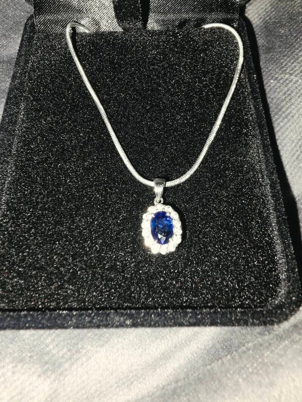 Dazzling blue Sapphire with zircons pendant