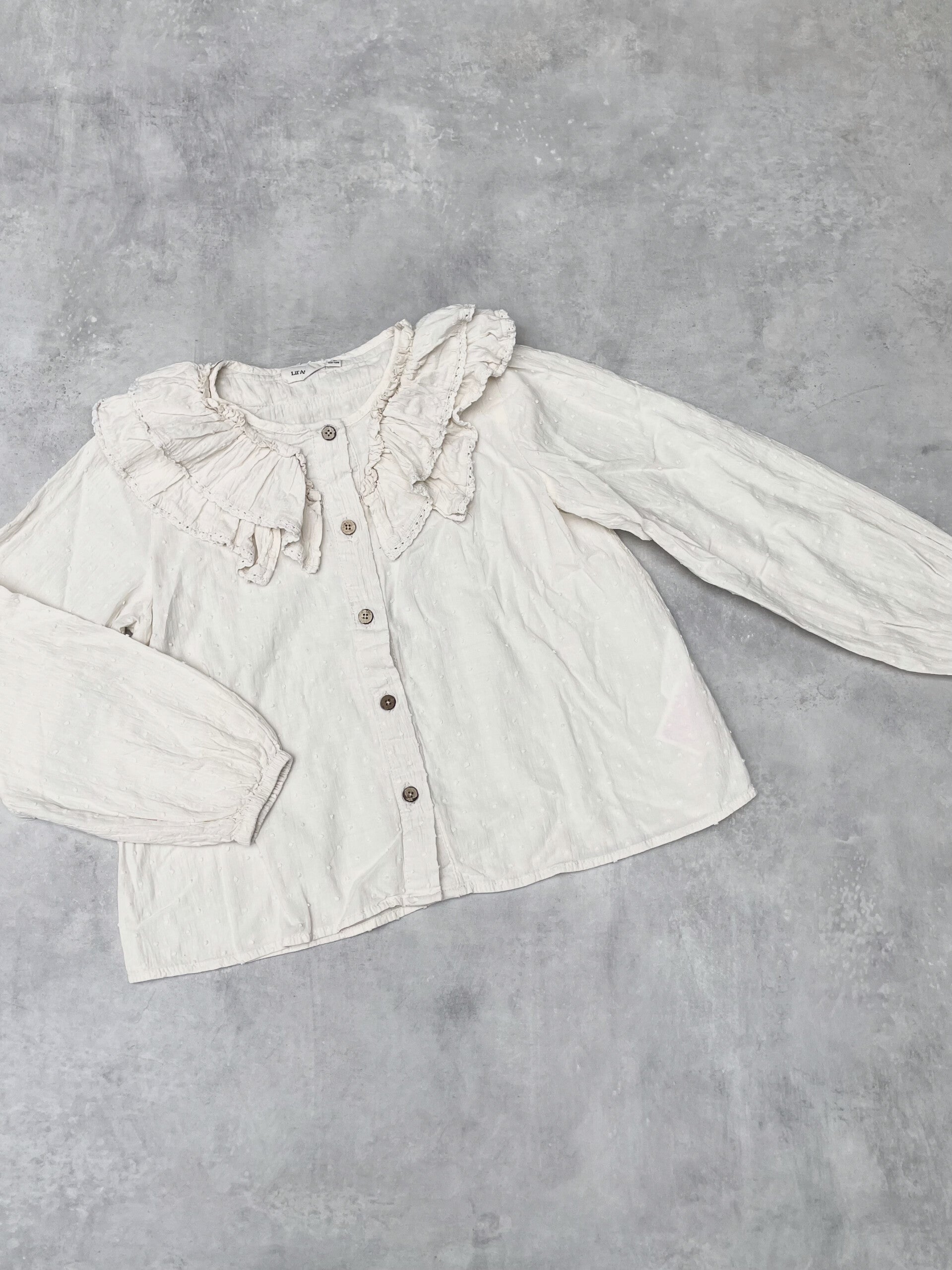 Lil' Atelier ruffle blouse - Maat 122/128