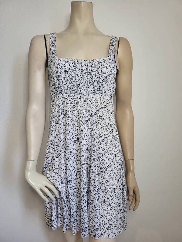 Jurk bloemen print mouwloos wit