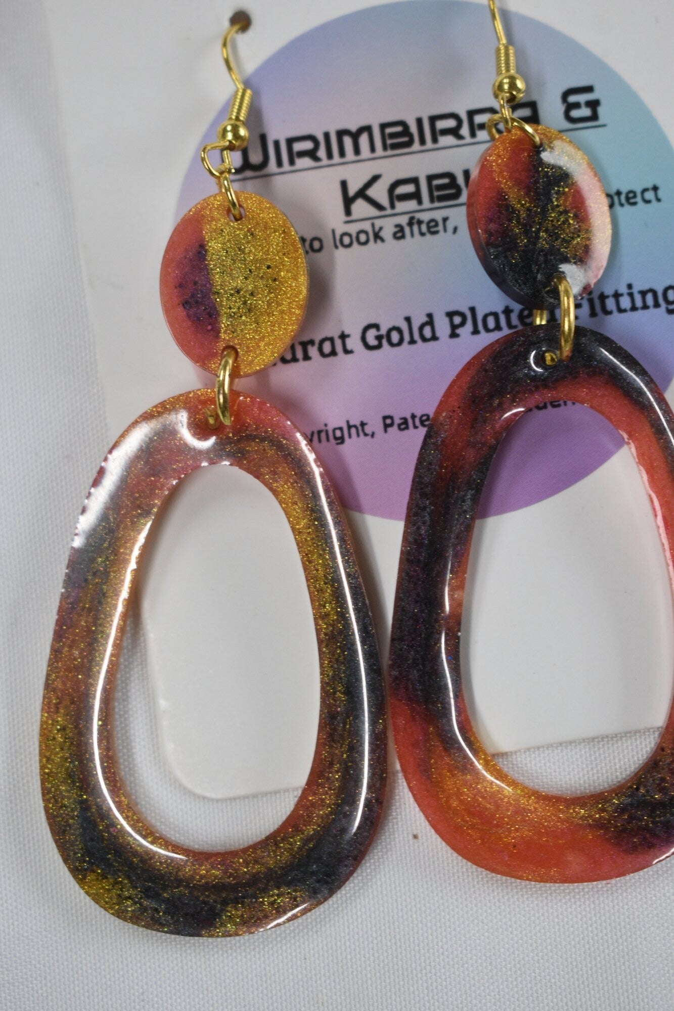 Open Oval Hoop With Round Drop Resin Earrings - Orange, Red & Black Gold Glitter