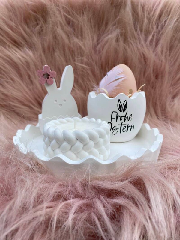 Osterhase, Osterei und kleine Kerze