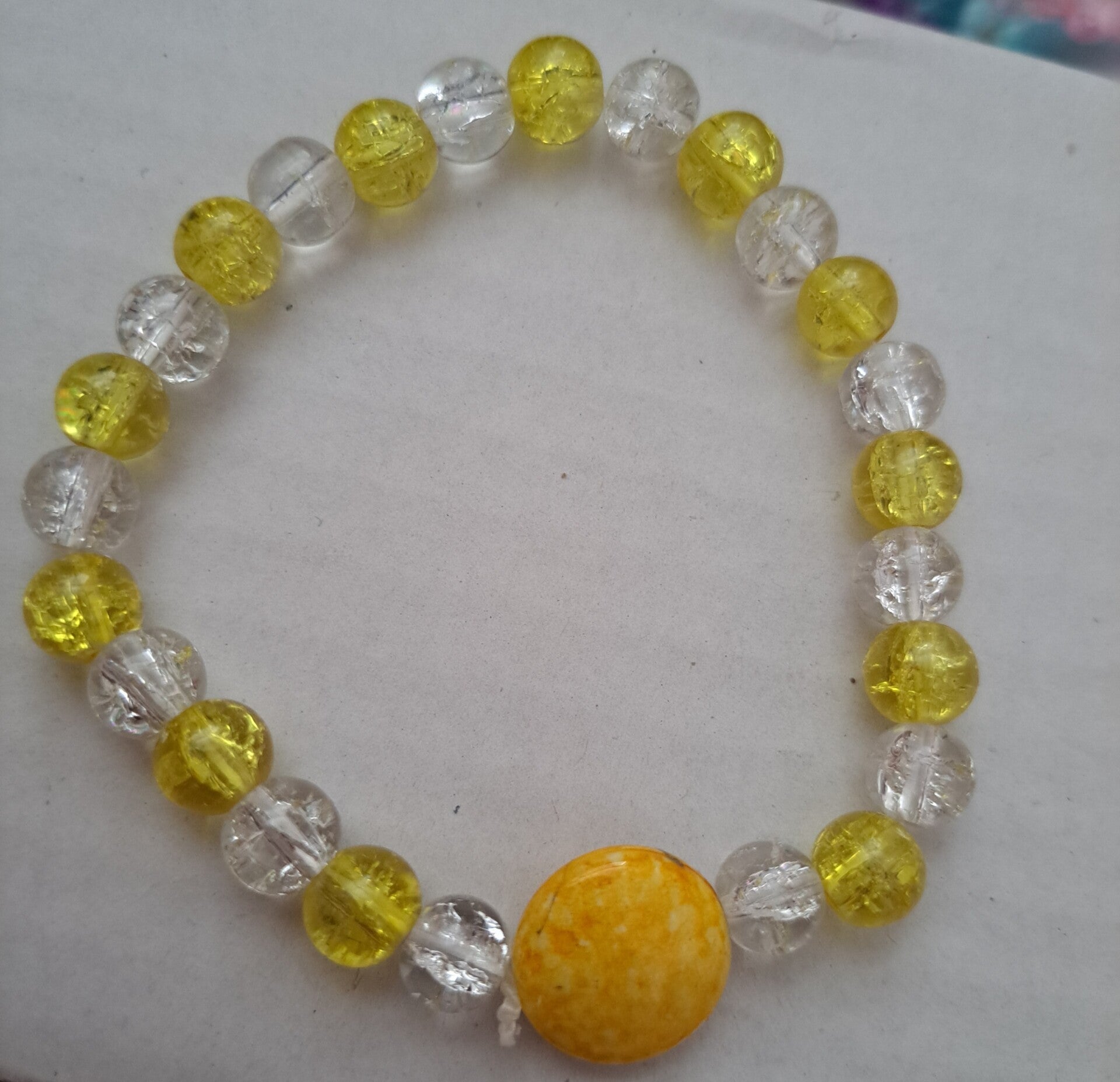 Yellow round charm braclet