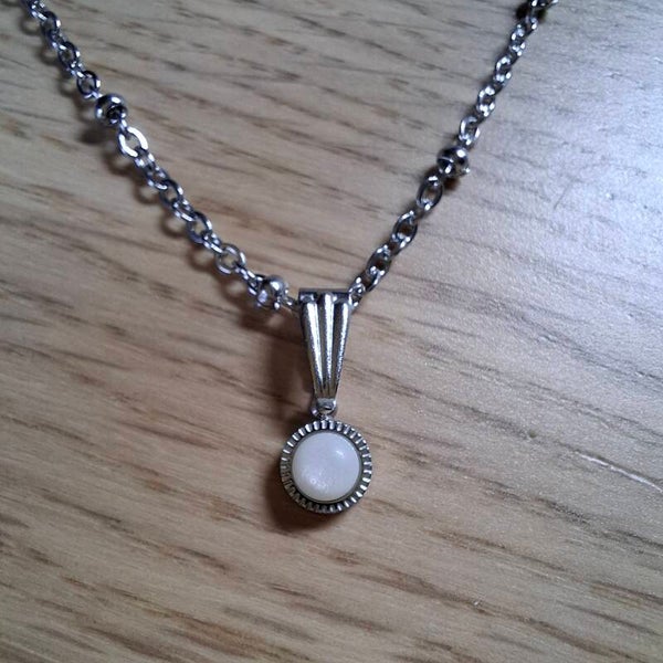 Balletjes ketting geboortesteen rvs