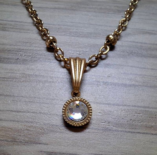 Balletjes ketting geboortesteen rvs gold klassiek