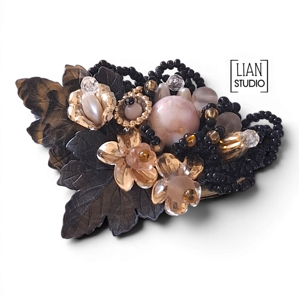 Botanische vintage broche zwart-goudkleur