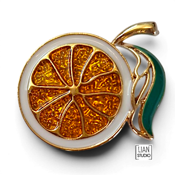 Fruity fanta sinaasappel broche goud