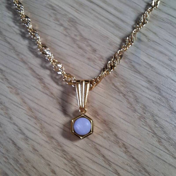 Golvende schakelketting geboortesteen