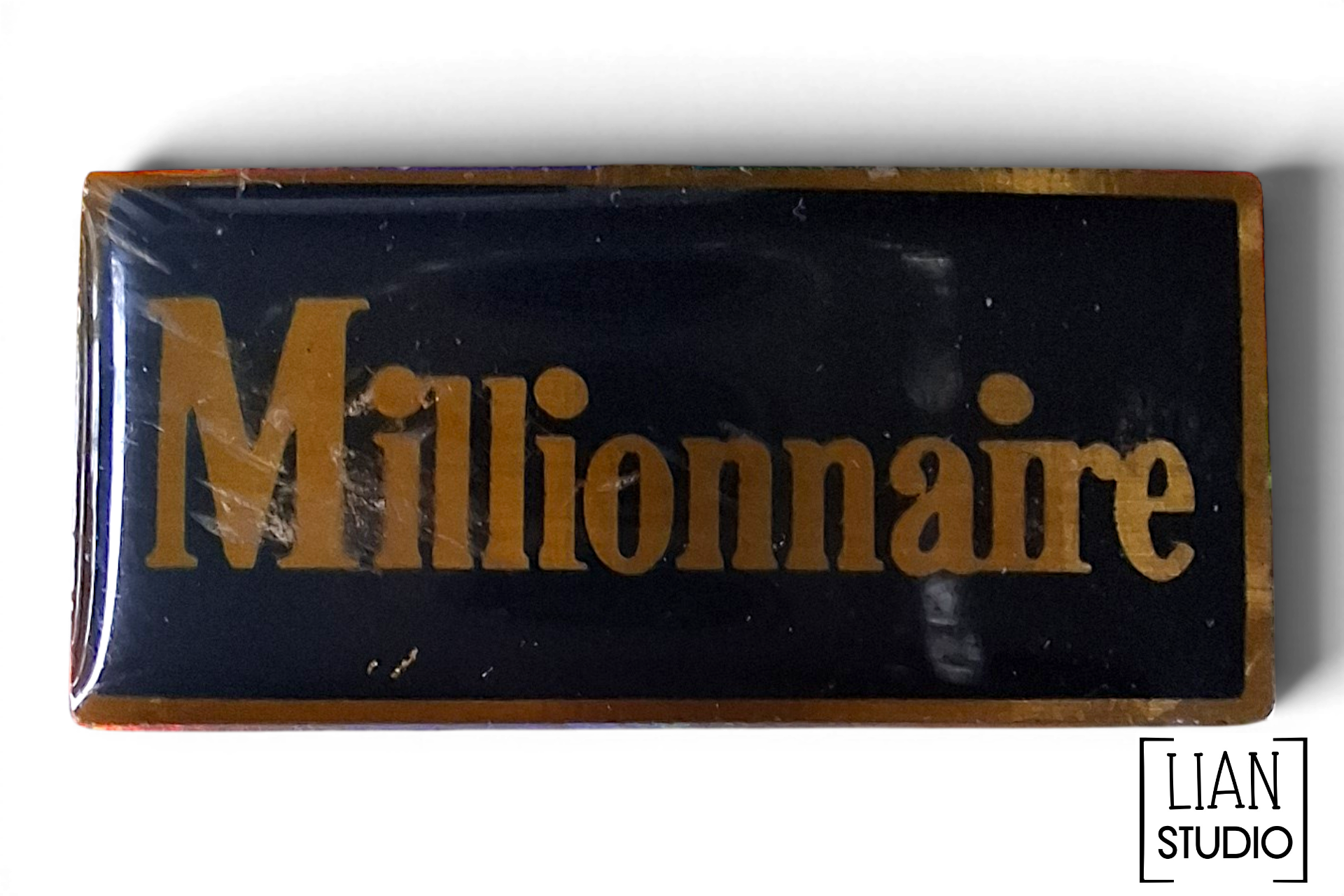 vintage Millionnaire pin blauw met goudkleur