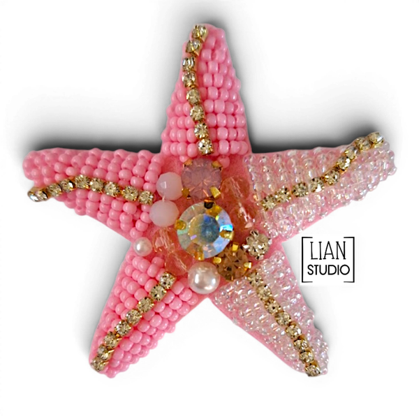 Staryu roze broche zeester speld kralen