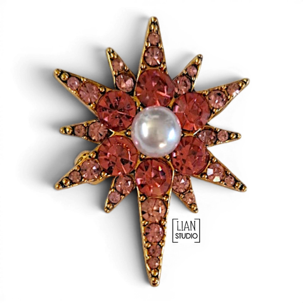Roze poolster broche strass speld ster