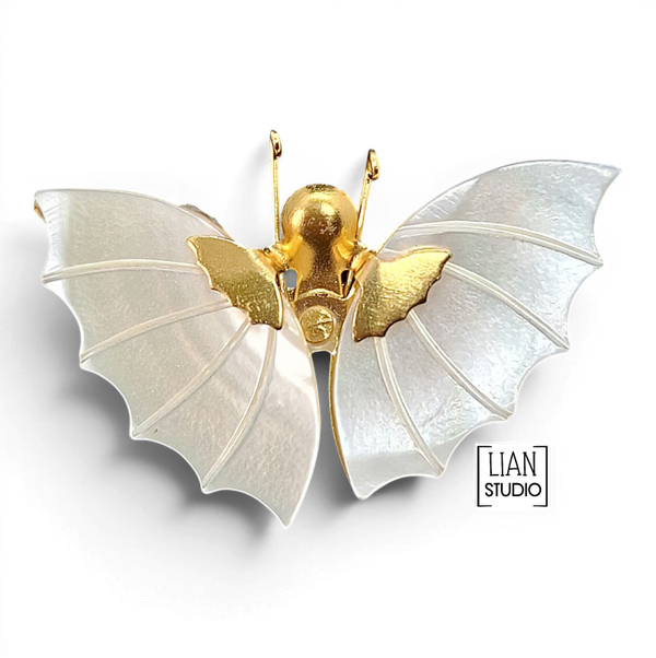Vintage vlinder broche goudkleurig