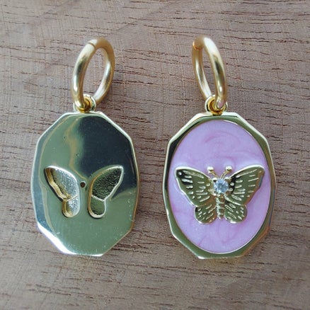 Roze vlinder charm hanger bedel goldplated