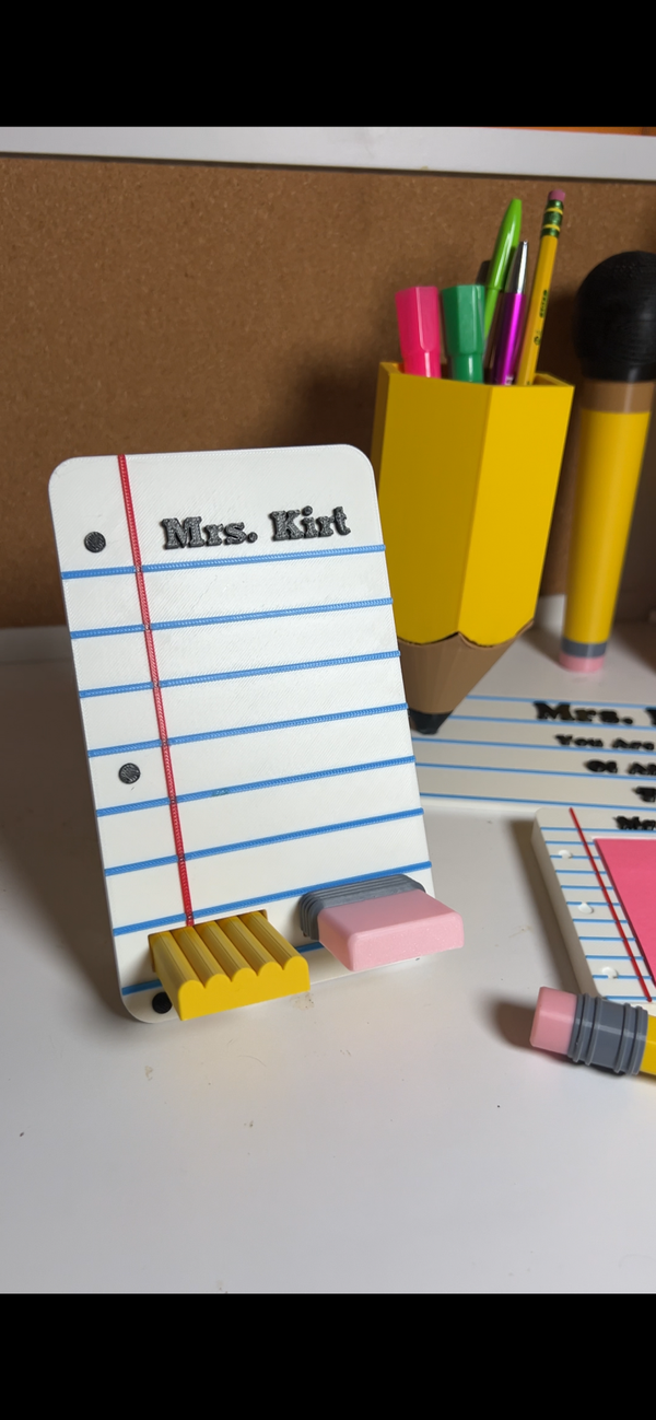 Notebook phone holder